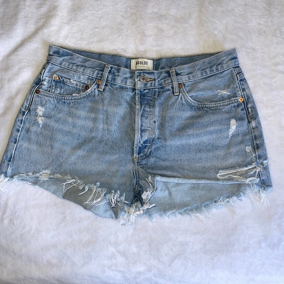 Agolde jean shorts, light wash with de-stressing.